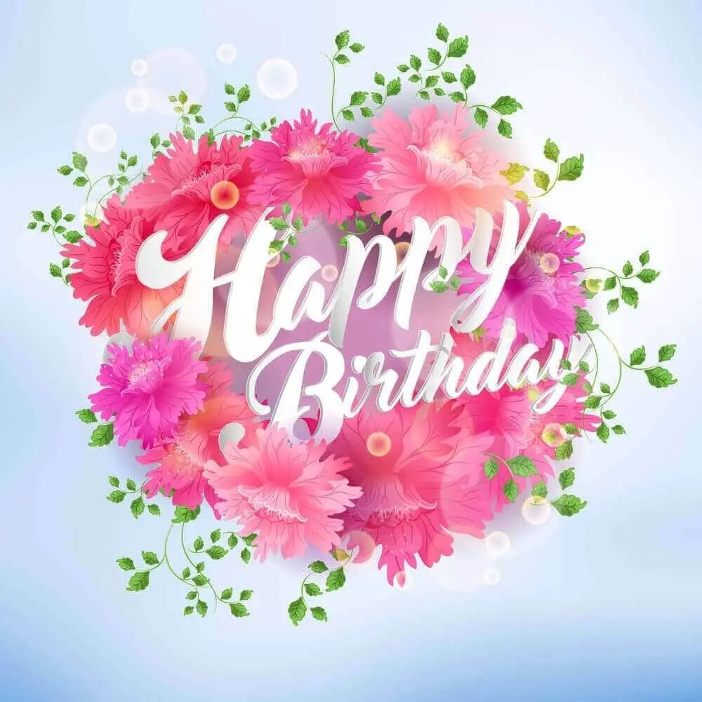 happy birthday text little hidden inside beautiful pink flowers expressing happy birthday wishes
